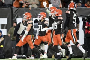 CLEVELAND, OHIO - NOVEMBER 16: Carson Schwesinger #49 of the Cleveland Browns celebrates after an interception against the Baltimore Ravens with teammates during the third quarter at Huntington Bank Field on November 16, 2025 in Cleveland, Ohio.
