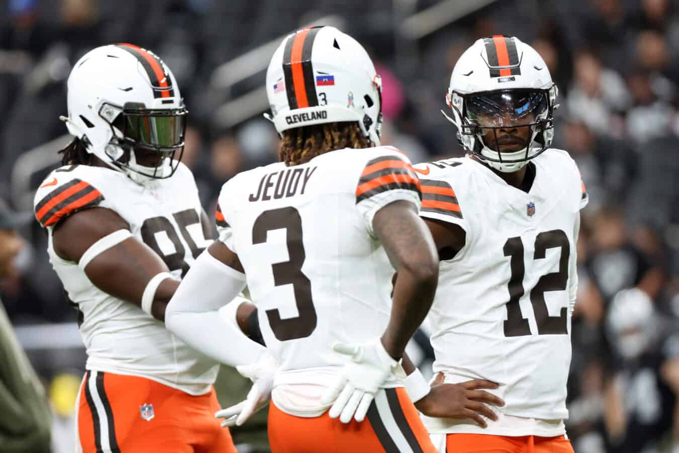 LAS VEGAS, NEVADA - NOVEMBER 23: (L-R) David Njoku #85, Jerry Jeudy #3 and Shedeur Sanders #12 of the Cleveland Browns talk prior to the game against the Las Vegas Raiders at Allegiant Stadium on November 23, 2025 in Las Vegas, Nevada.