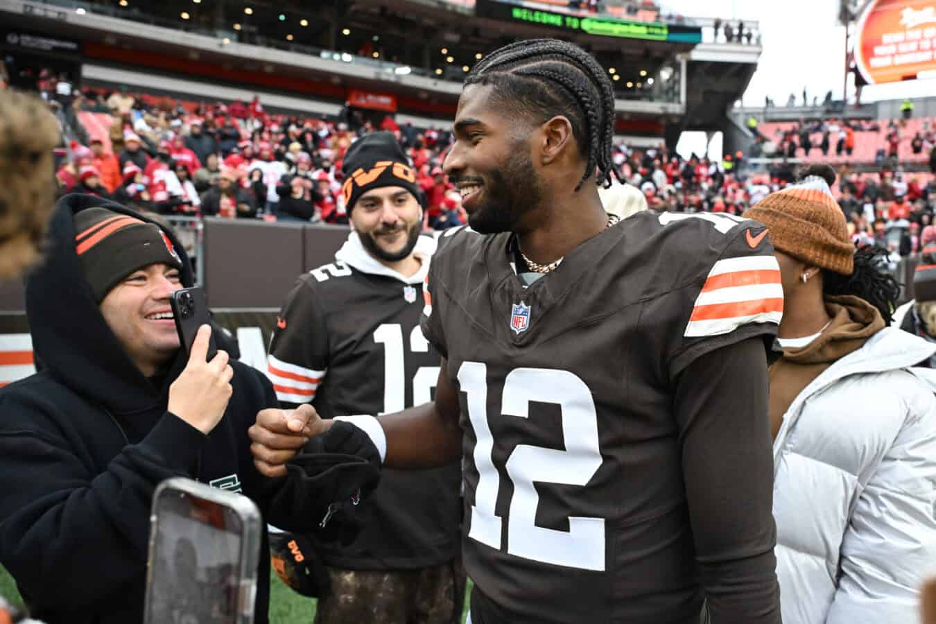 CLEVELAND, OHIO - NOVEMBER 30: Shedeur Sanders #12 of the Cleveland Browns interacts with fans before the game against the San Francisco 49ers at Huntington Bank Field on November 30, 2025 in Cleveland, Ohio