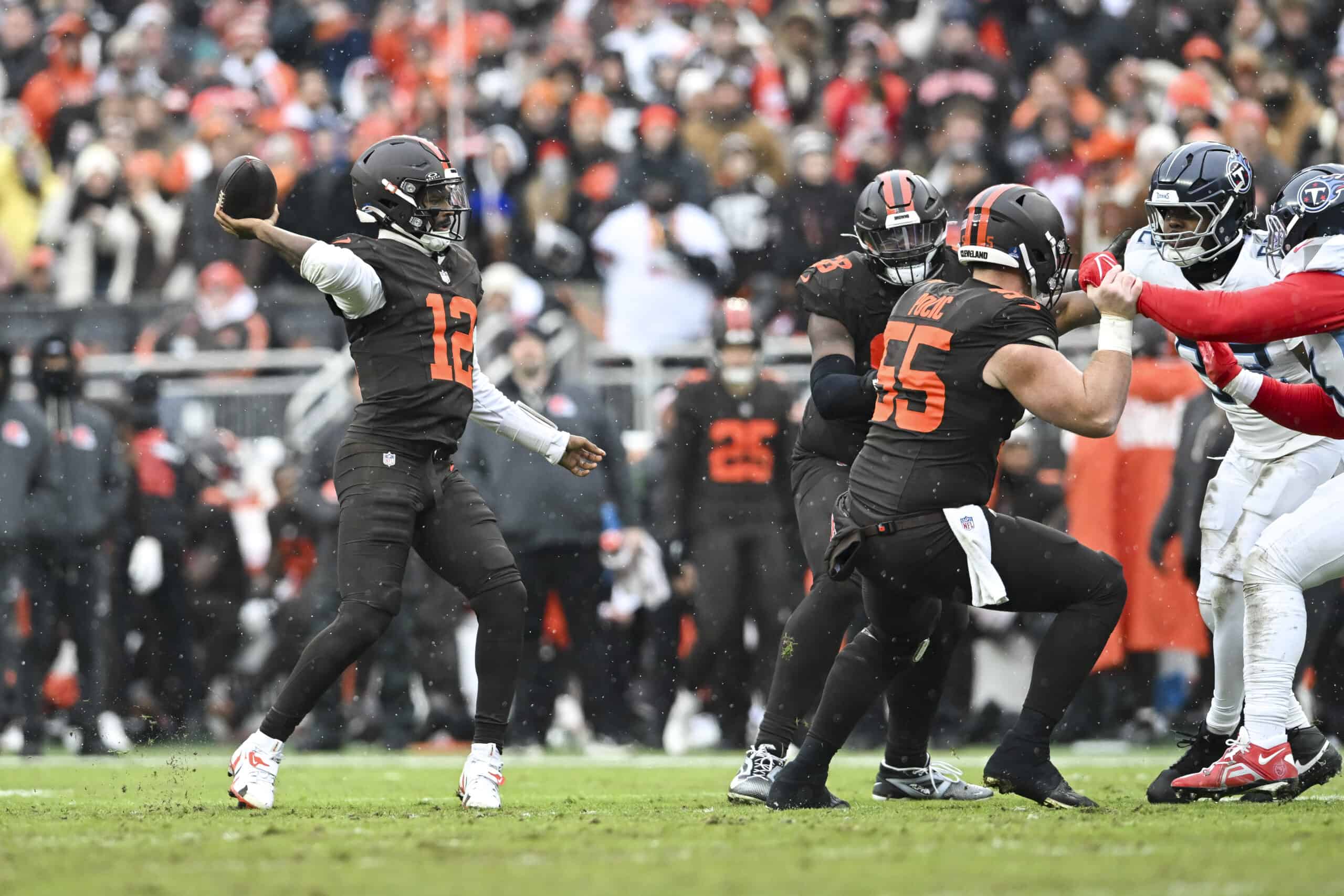 CLEVELAND, OHIO - DECEMBER 07: Shedeur Sanders #12 of the Cleveland Browns throws a pass against the Baltimore Ravens during the first quarter at Huntington Bank Field on December 07, 2025 in Cleveland, Ohio.