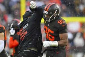 CLEVELAND, OHIO - DECEMBER 07: Myles Garrett #95 of the Cleveland Browns celebrates a second quarter sack against the Tennessee Titans at Huntington Bank Field on December 07, 2025 in Cleveland, Ohio.