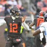 CLEVELAND, OHIO - DECEMBER 07: Shedeur Sanders #12 of the Cleveland Browns looks to pass against the Tennessee Titans during the first half at Huntington Bank Field on December 07, 2025 in Cleveland, Ohio.
