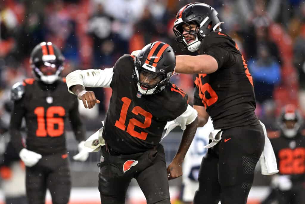 CLEVELAND, OHIO - DECEMBER 07: Shedeur Sanders #12 of the Cleveland Browns#2 and Blake Whiteheart #86 of the Cleveland Browns celebrate a touchdown from Sanders during the fourth quarter at Huntington Bank Field on December 07, 2025 in Cleveland, Ohio.