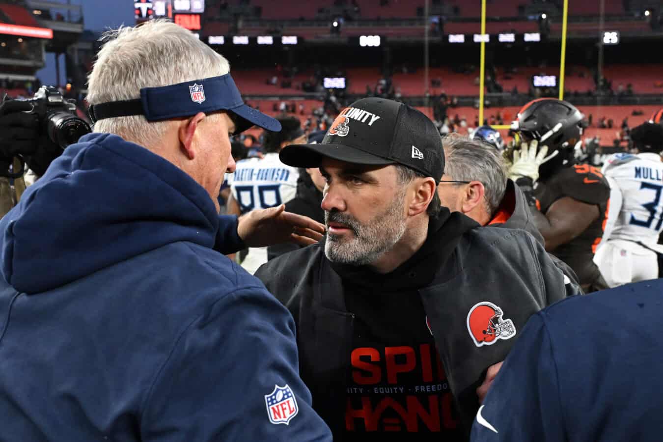 CLEVELAND, OHIO - DECEMBER 07: Head coach Kevin Stefanski of the Cleveland Browns and interim head coach Mike McCoy of the Tennessee Titans meet after the game at Huntington Bank Field on December 07, 2025 in Cleveland, Ohio.