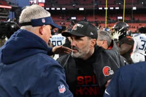 CLEVELAND, OHIO - DECEMBER 07: Head coach Kevin Stefanski of the Cleveland Browns and interim head coach Mike McCoy of the Tennessee Titans meet after the game at Huntington Bank Field on December 07, 2025 in Cleveland, Ohio.