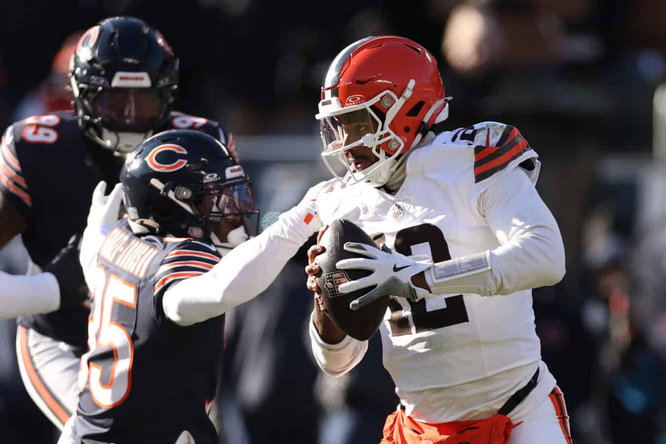 CHICAGO, ILLINOIS - DECEMBER 14: Shedeur Sanders #12 of the Cleveland Browns scrambles during the first quarter against the Chicago Bears at Soldier Field on December 14, 2025 in Chicago, Illinois.