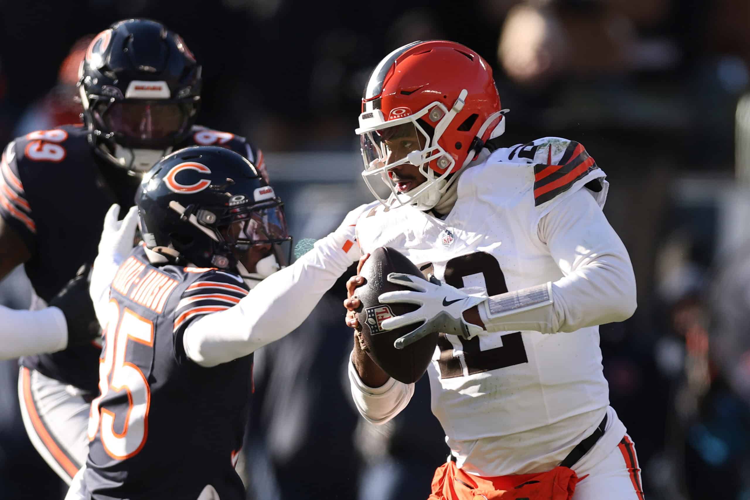 CHICAGO, ILLINOIS - DECEMBER 14: Shedeur Sanders #12 of the Cleveland Browns scrambles during the first quarter against the Chicago Bears at Soldier Field on December 14, 2025 in Chicago, Illinois.
