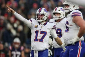FOXBOROUGH, MASSACHUSETTS - DECEMBER 14: Josh Allen #17 of the Buffalo Bills reacts during the third quarter against the New England Patriots at Gillette Stadium on December 14, 2025 in Foxborough, Massachusetts.