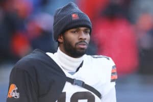 CHICAGO, ILLINOIS - DECEMBER 14: Shedeur Sanders #12 of the Cleveland Browns looks on during a game against the Chicago Bears at Soldier Field on December 14, 2025 in Chicago, Illinois.