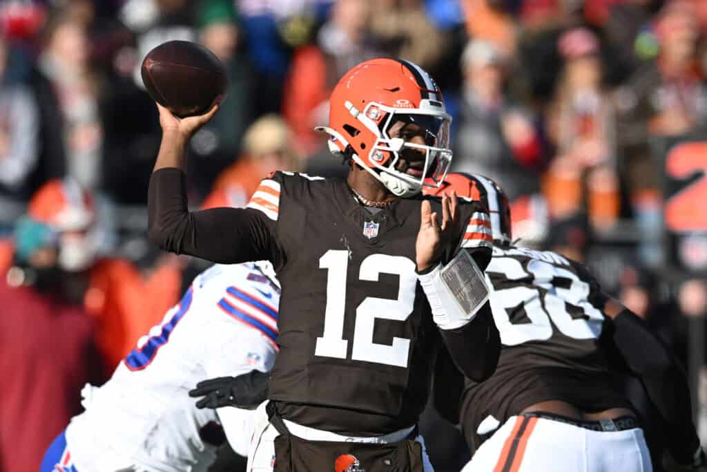 CLEVELAND, OHIO - DECEMBER 21: Shedeur Sanders #12 of the Cleveland Browns looks to pass over the defense of the Buffalo Bills at Huntington Bank Field on December 21, 2025 in Cleveland, Ohio.
