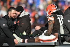 CLEVELAND, OHIO - DECEMBER 21: Quinshon Judkins #10 of the Cleveland Browns is carted off in the second quarter of the game against the Buffalo Bills at Huntington Bank Field on December 21, 2025 in Cleveland, Ohio.