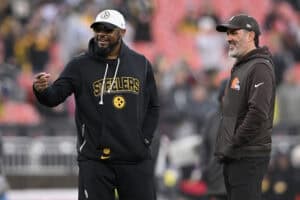 CLEVELAND, OHIO - DECEMBER 28: Head coach Mike Tomlin of the Pittsburgh Steelers and head coach Kevin Stefanski of the Cleveland Browns look on prior to the game at Huntington Bank Field on December 28, 2025 in Cleveland, Ohio.