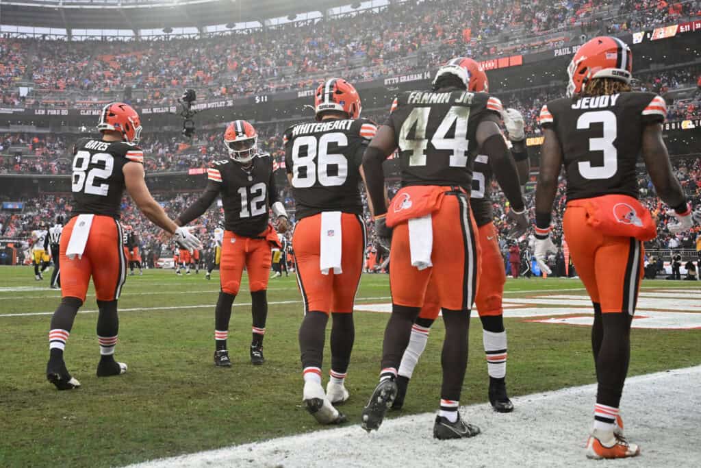 CLEVELAND, OHIO - DECEMBER 28: Brenden Bates #82 and Shedeur Sanders #12 of the Cleveland Browns celebrate a touchdown during the first quarter of the game against the Pittsburgh Steelers at Huntington Bank Field on December 28, 2025 in Cleveland, Ohio.