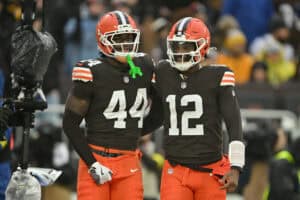 CLEVELAND, OHIO - DECEMBER 28: Harold Fannin Jr. #44 and Shedeur Sanders #12 of the Cleveland Browns react after a touchdown pass during the first quarter of the game against the Pittsburgh Steelers at Huntington Bank Field on December 28, 2025 in Cleveland, Ohio.