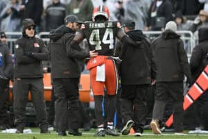 CLEVELAND, OHIO - DECEMBER 28: Harold Fannin Jr. #44 of the Cleveland Browns is helped off the field after being hurt catching a touchdown during the first quarter of the game against the Pittsburgh Steelers at Huntington Bank Field on December 28, 2025 in Cleveland, Ohio.