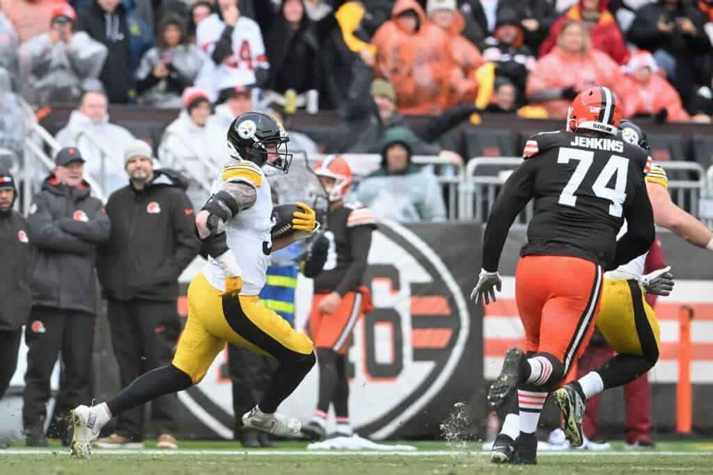 CLEVELAND, OHIO - DECEMBER 28: Jack Sawyer #33 of the Pittsburgh Steelers returns an interception during the second quarter of the game against the Cleveland Browns at Huntington Bank Field on December 28, 2025 in Cleveland, Ohio.