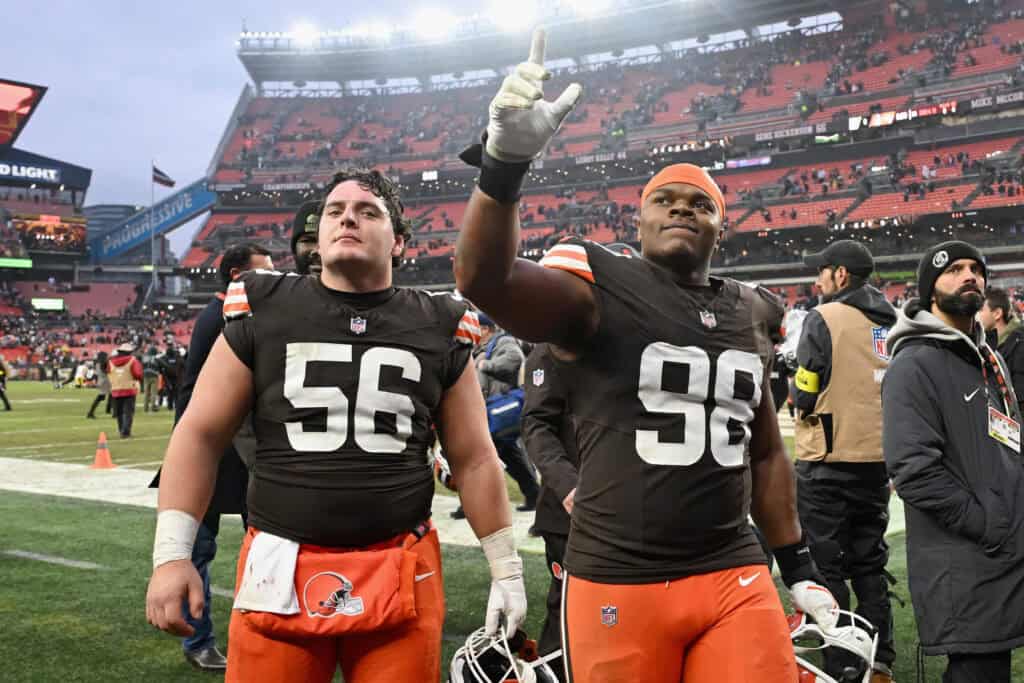 CLEVELAND, OHIO - DECEMBER 28: Luke Wypler #56 and Adin Huntington #98 of the Cleveland Browns react after their win against the Pittsburgh Steelers at Huntington Bank Field on December 28, 2025 in Cleveland, Ohio.