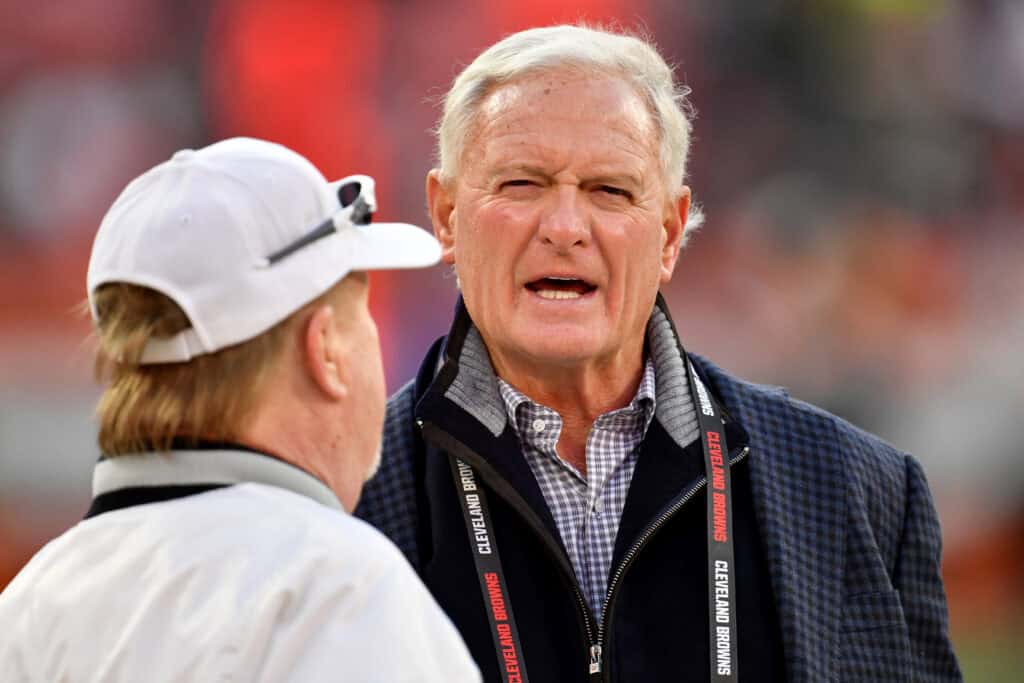 CLEVELAND, OHIO - DECEMBER 20: Las Vegas Raiders owner Mark Davis and Cleveland Browns owner Jimmy Haslam talk before the game bat FirstEnergy Stadium on December 20, 2021 in Cleveland, Ohio. (