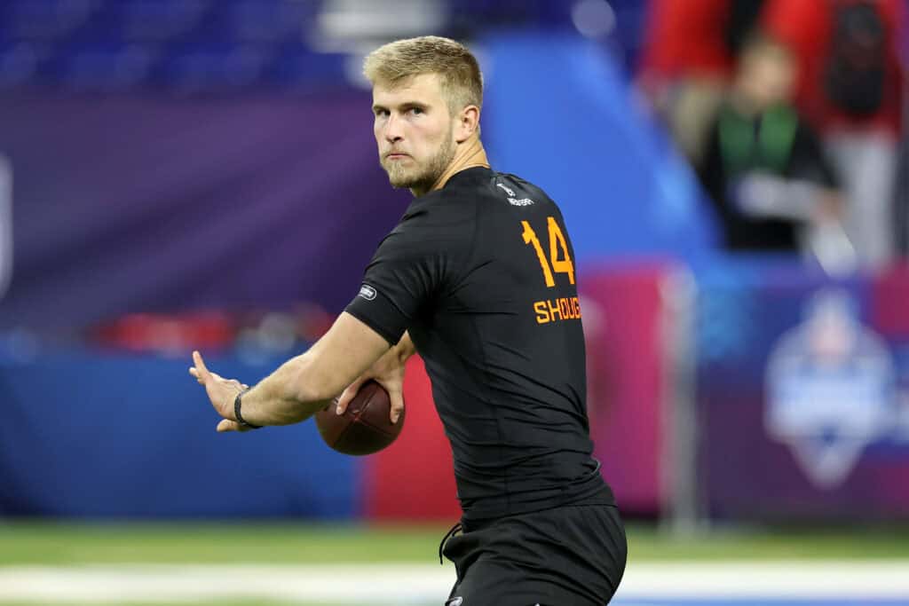 INDIANAPOLIS, INDIANA - MARCH 01: Tyler Shough #QB14 of Louisville participates in a drill during the NFL Scouting Combine at Lucas Oil Stadium on March 01, 2025 in Indianapolis, Indiana.