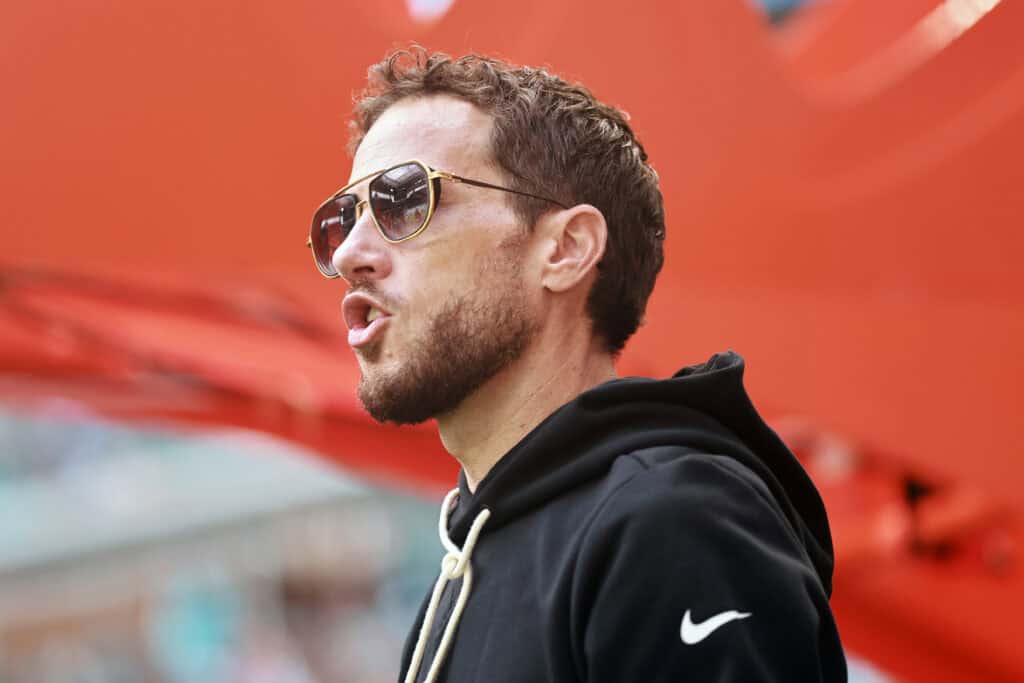 MIAMI GARDENS, FLORIDA - OCTOBER 12: Head coach Mike McDaniel of the Miami Dolphins reacts against the Los Angeles Chargers during the first quarter in the game at Hard Rock Stadium on October 12, 2025 in Miami Gardens, Florida.