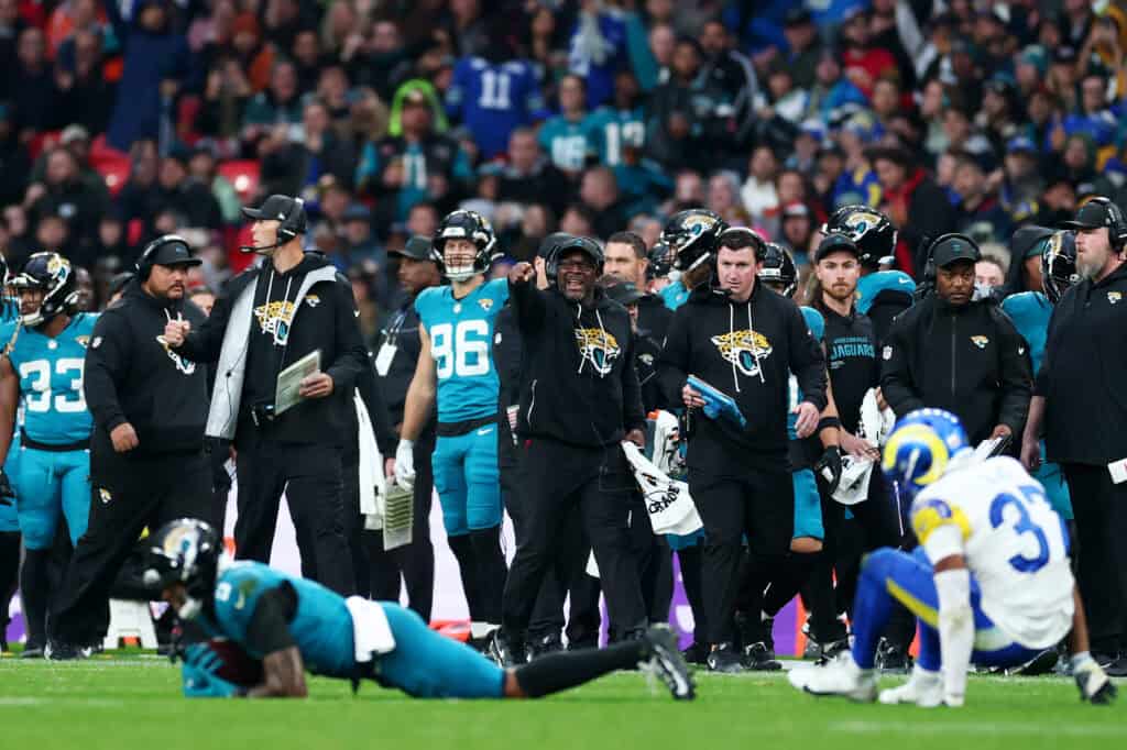 LONDON, ENGLAND - OCTOBER 19: Jacksonville Jaguars wide receivers coach Edgar Bennett cheers the players next to Offensive Coordinator Grant Udinski during the NFL 2025 game between Los Angeles Rams and Jacksonville Jaguars at Wembley Stadium on October 19, 2025 in London, England."" (