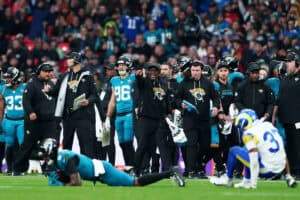 LONDON, ENGLAND - OCTOBER 19: Jacksonville Jaguars wide receivers coach Edgar Bennett cheers the players next to Offensive Coordinator Grant Udinski during the NFL 2025 game between Los Angeles Rams and Jacksonville Jaguars at Wembley Stadium on October 19, 2025 in London, England."" (