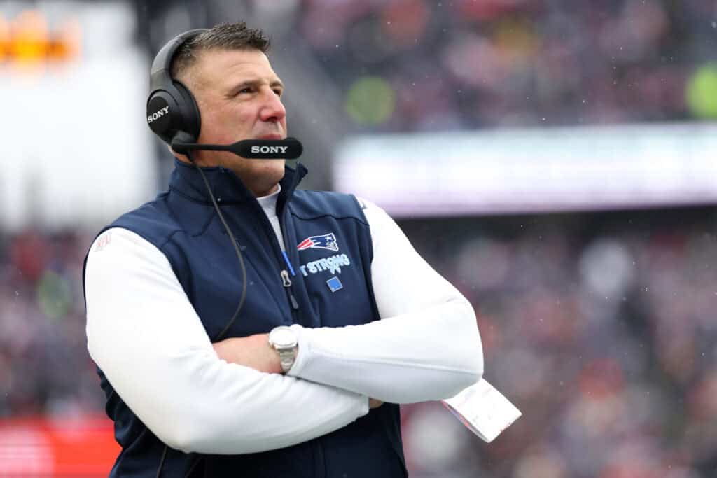 FOXBOROUGH, MASSACHUSETTS - DECEMBER 14: Head coach Mike Vrabel of the New England Patriots looks on during the second quarter against the Buffalo Bills at Gillette Stadium on December 14, 2025 in Foxborough, Massachusetts.