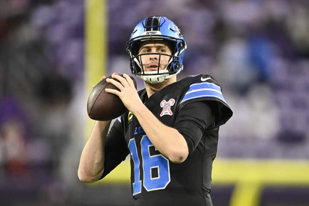 MINNEAPOLIS, MINNESOTA - DECEMBER 25: Jared Goff #16 of the Detroit Lions warms up prior to the game against the Minnesota Vikings at U.S. Bank Stadium on December 25, 2025 in Minneapolis, Minnesota.