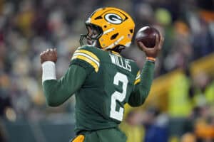 GREEN BAY, WISCONSIN - DECEMBER 27: Malik Willis #2 of the Green Bay Packers warms up before the game against the Baltimore Ravens at Lambeau Field on December 27, 2025 in Green Bay, Wisconsin.