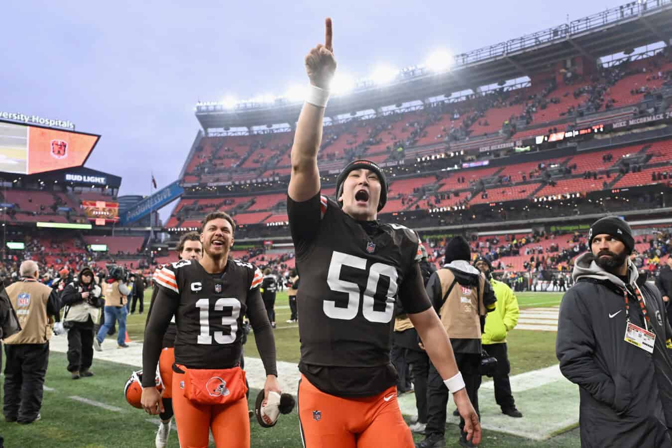 CLEVELAND, OHIO - DECEMBER 28: Corey Bojorquez #13 and Rex Sunahara #50 of the Cleveland Browns react after their win against the Pittsburgh Steelers at Huntington Bank Field on December 28, 2025 in Cleveland, Ohio. The Cleveland Browns defeated the Pittsburgh Steelers 13-6.