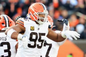 CINCINNATI, OHIO - JANUARY 04: Myles Garrett #95 of the Cleveland Browns celebrates after breaking the NFL single-season sack record during the fourth quarter of the game against the Cincinnati Bengals at Paycor Stadium on January 04, 2026 in Cincinnati, Ohio.