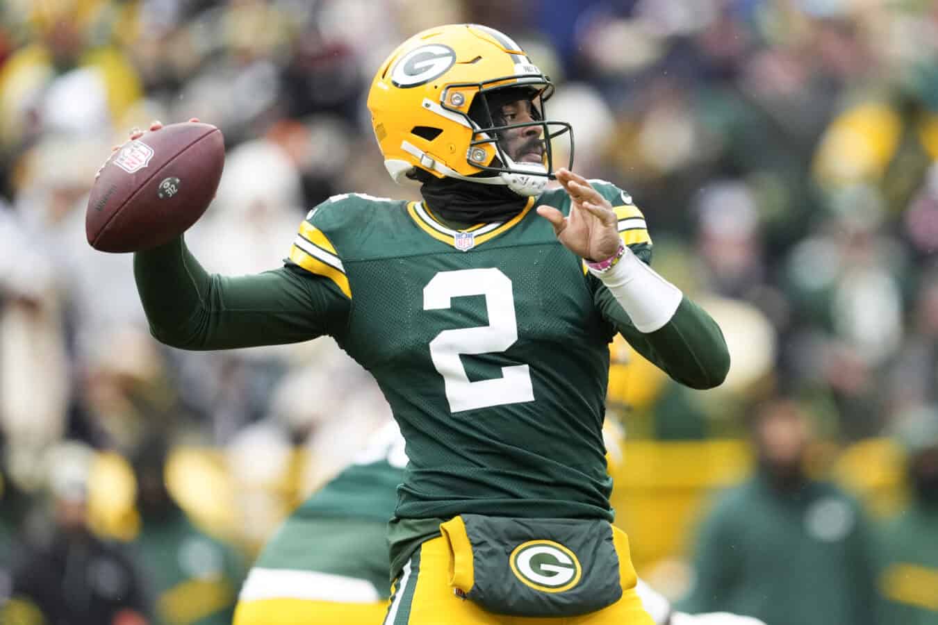 GREEN BAY, WISCONSIN - JANUARY 05: Malik Willis #2 of the Green Bay Packers throws a pass in the second quarter against the Chicago Bears at Lambeau Field on January 05, 2025 in Green Bay, Wisconsin.