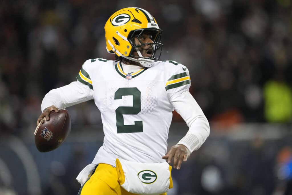 CHICAGO, ILLINOIS - DECEMBER 20: Malik Willis #2 of the Green Bay Packers looks to pass against the Chicago Bears during the third quarter at Soldier Field on December 20, 2025 in Chicago, Illinois.