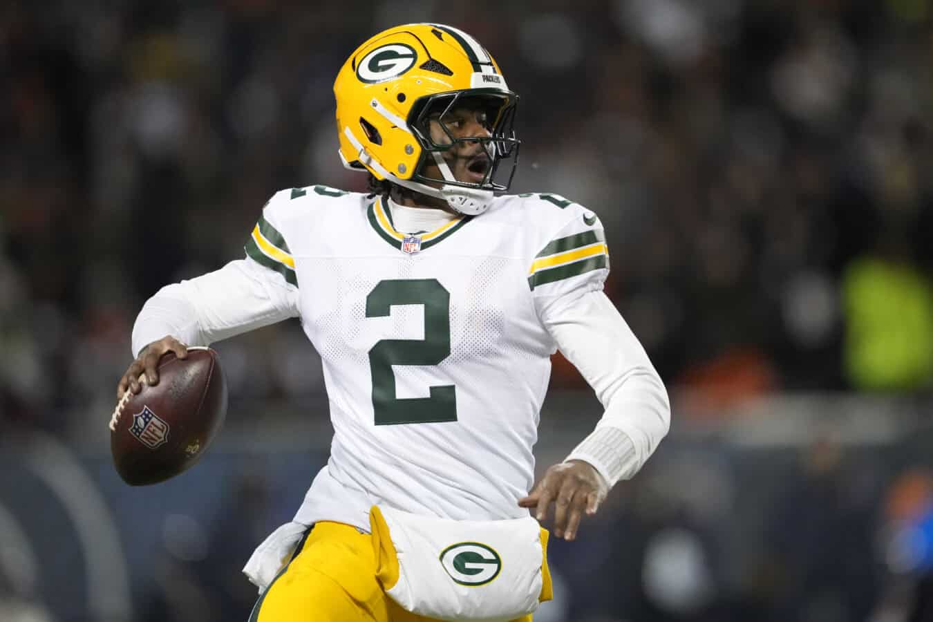CHICAGO, ILLINOIS - DECEMBER 20: Malik Willis #2 of the Green Bay Packers looks to pass against the Chicago Bears during the third quarter at Soldier Field on December 20, 2025 in Chicago, Illinois.