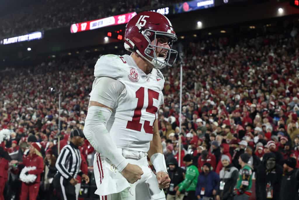 NORMAN, OKLAHOMA - DECEMBER 19: Ty Simpson #15 of the Alabama Crimson Tide celebrates a touchdown during the third quarter against the Oklahoma Sooners during 2025 College Football Playoff First Round Game at Gaylord Family Oklahoma Memorial Stadium on December 19, 2025 in Norman, Oklahoma.