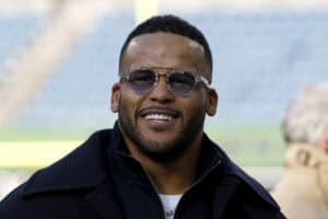 SEATTLE, WASHINGTON - JANUARY 25: Former Los Angeles Rams player Aaron Donald looks on prior to a game between the Los Angeles Rams and the Seattle Seahawks in the NFC Championship game at Lumen Field on January 25, 2026 in Seattle, Washington.