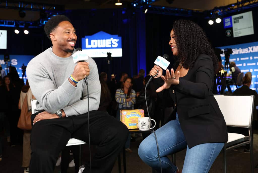 SAN FRANCISCO, CALIFORNIA - FEBRUARY 06: (L-R) Myles Garrett visits Janine Rubenstein at SiriusXM on Radio Row at Super Bowl LX on February 06, 2026 in San Francisco, California.