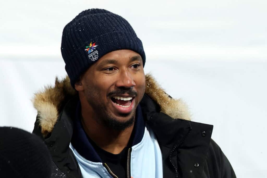 LIVIGNO, ITALY - FEBRUARY 12: Cleveland Browns defensive end Myles Garrett attends the Women’s Snowboard Halfpipe Final wearing a jacket in support of Chloe Kim of Team United States on day six of the Milano Cortina 2026 Winter Olympic games at Livigno Snow Park on February 12, 2026 in Livigno, Italy.
