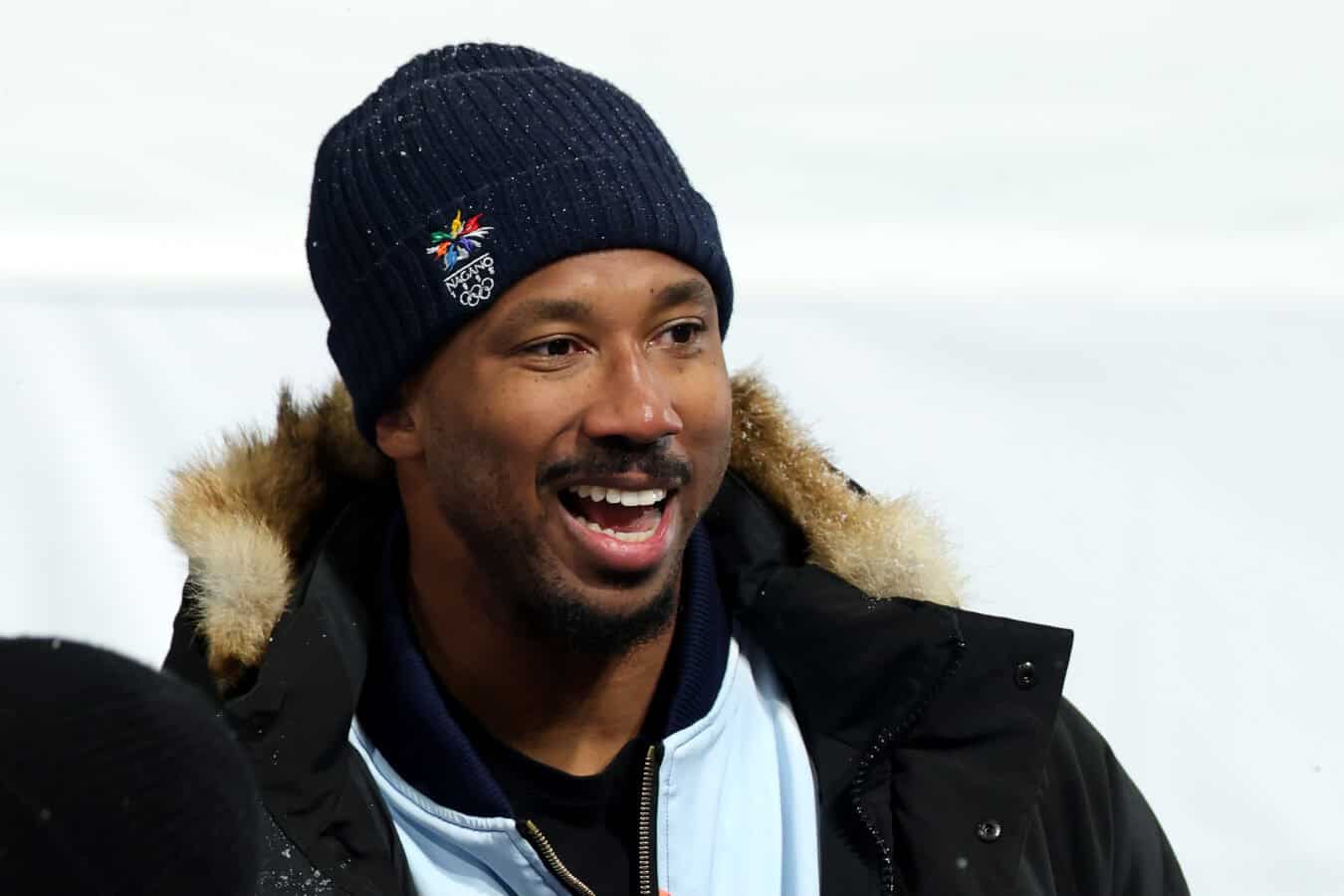 LIVIGNO, ITALY - FEBRUARY 12: Cleveland Browns defensive end Myles Garrett attends the Women’s Snowboard Halfpipe Final wearing a jacket in support of Chloe Kim of Team United States on day six of the Milano Cortina 2026 Winter Olympic games at Livigno Snow Park on February 12, 2026 in Livigno, Italy.
