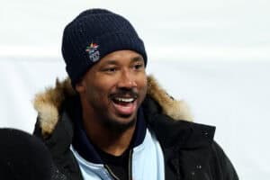 LIVIGNO, ITALY - FEBRUARY 12: Cleveland Browns defensive end Myles Garrett attends the Women’s Snowboard Halfpipe Final wearing a jacket in support of Chloe Kim of Team United States on day six of the Milano Cortina 2026 Winter Olympic games at Livigno Snow Park on February 12, 2026 in Livigno, Italy.