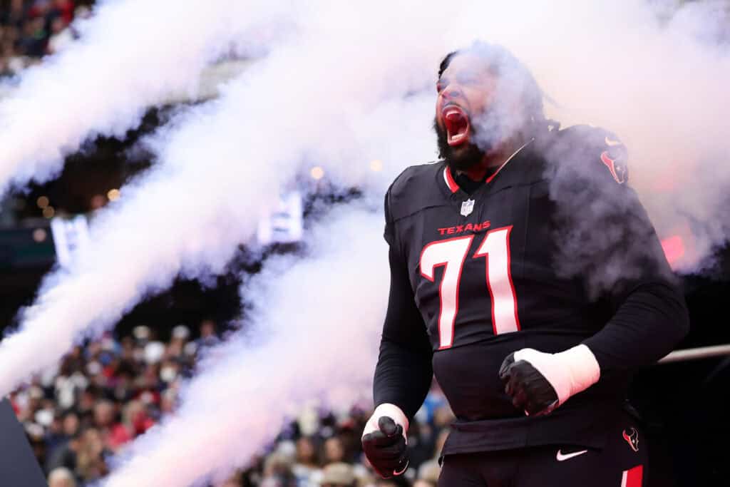 HOUSTON, TEXAS - JANUARY 11: Tytus Howard #71 of the Houston Texans takes the field prior to a game against the Los Angeles Chargers during the AFC Wild Card Playoffs at NRG Stadium on January 11, 2025 in Houston, Texas.