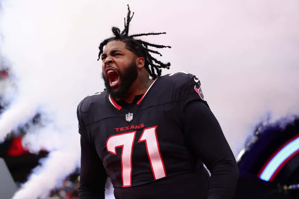 HOUSTON, TEXAS - JANUARY 11: Tytus Howard #71 of the Houston Texans takes the field before a game against the Los Angeles Chargers during the AFC Wild Card Playoffs at NRG Stadium on January 11, 2025 in Houston, Texas.