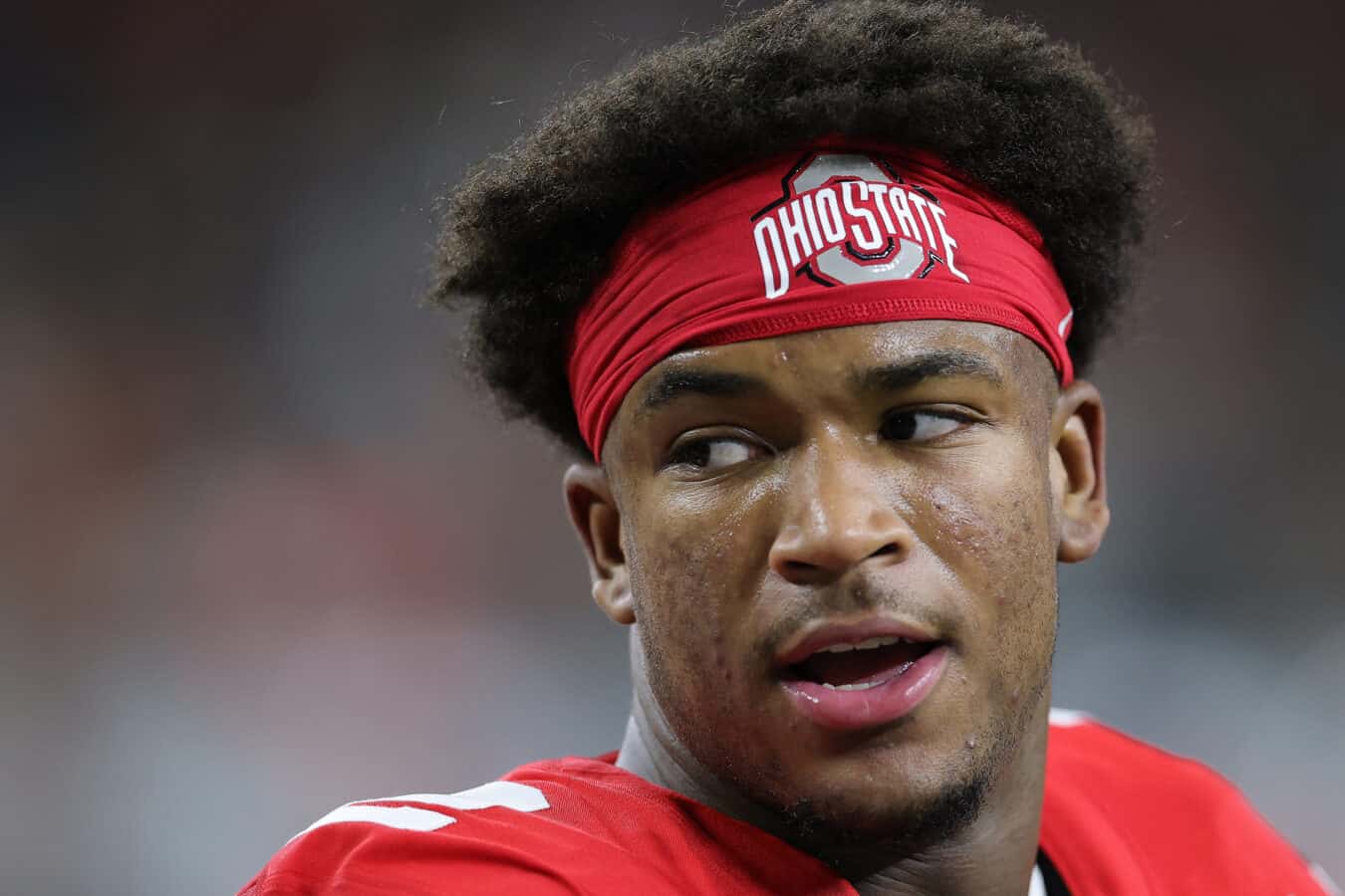 ARLINGTON, TEXAS - DECEMBER 31: Caleb Downs #2 of the Ohio State Buckeyes looks on prior to a game against the Miami Hurricanes during the 2025 College Football Playoff Quarterfinal at the 90th Goodyear Cotton Bowl Classic at AT&T Stadium on December 31, 2025 in Arlington, Texas.