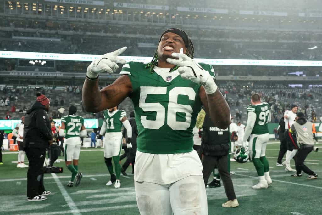 EAST RUTHERFORD, NEW JERSEY - NOVEMBER 30: Quincy Williams #56 of the New York Jets celebrates after the game against the Atlanta Falcons at MetLife Stadium on November 30, 2025 in East Rutherford, New Jersey.