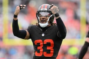 CLEVELAND, OHIO - OCTOBER 19: Ronnie Hickman Jr. #33 of the Cleveland Browns celebrates a tackle against the Miami Dolphins during the third quarter at Huntington Bank Field on October 19, 2025 in Cleveland, Ohio.