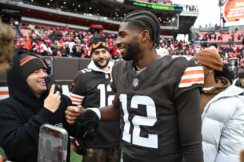 CLEVELAND, OHIO - NOVEMBER 30: Shedeur Sanders #12 of the Cleveland Browns interacts with fans before the game against the San Francisco 49ers at Huntington Bank Field on November 30, 2025 in Cleveland, Ohio.
