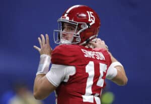 ATLANTA, GEORGIA - DECEMBER 06: Ty Simpson #15 of the Alabama Crimson Tide throws the ball against the Georgia Bulldogs during the first quarter in the 2025 SEC Championship at Mercedes-Benz Stadium on December 06, 2025 in Atlanta, Georgia.