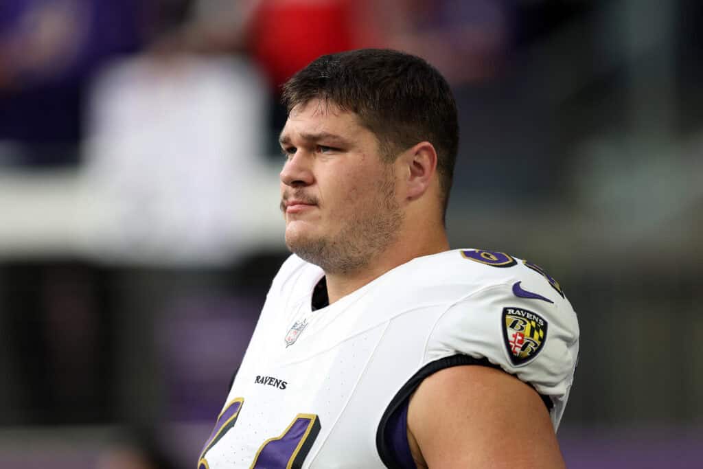 MINNEAPOLIS, MINNESOTA - NOVEMBER 09: Tyler Linderbaum #64 of the Baltimore Ravens looks on during warmups before the game against the Minnesota Vikings at U.S. Bank Stadium on November 09, 2025 in Minneapolis, Minnesota.