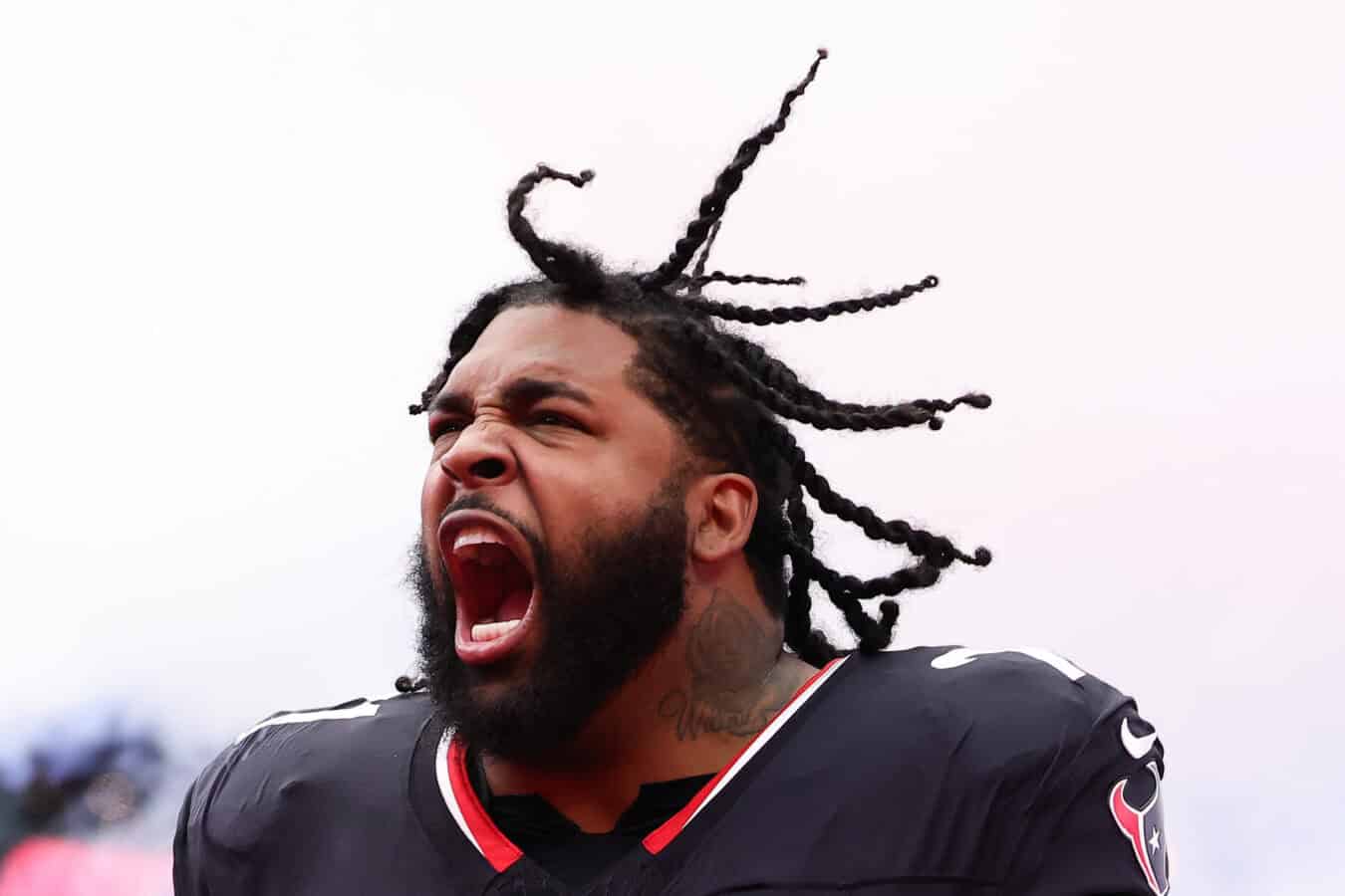 HOUSTON, TEXAS - JANUARY 11: Tytus Howard #71 of the Houston Texans takes the field prior to a game against the Los Angeles Chargers during the AFC Wild Card Playoffs at NRG Stadium on January 11, 2025 in Houston, Texas.