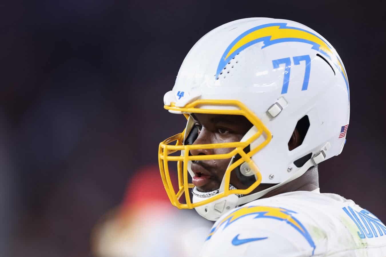 GLENDALE, ARIZONA - OCTOBER 21: Guard Zion Johnson #77 of the Los Angeles Chargers during the NFL game at State Farm Stadium on October 21, 2024 in Glendale, Arizona. The Cardinals defeated the Chargers 17-15.